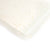An Oolie organic cotton crib sheet with the cream confetti print, a natural color with small, irregular spots of color.