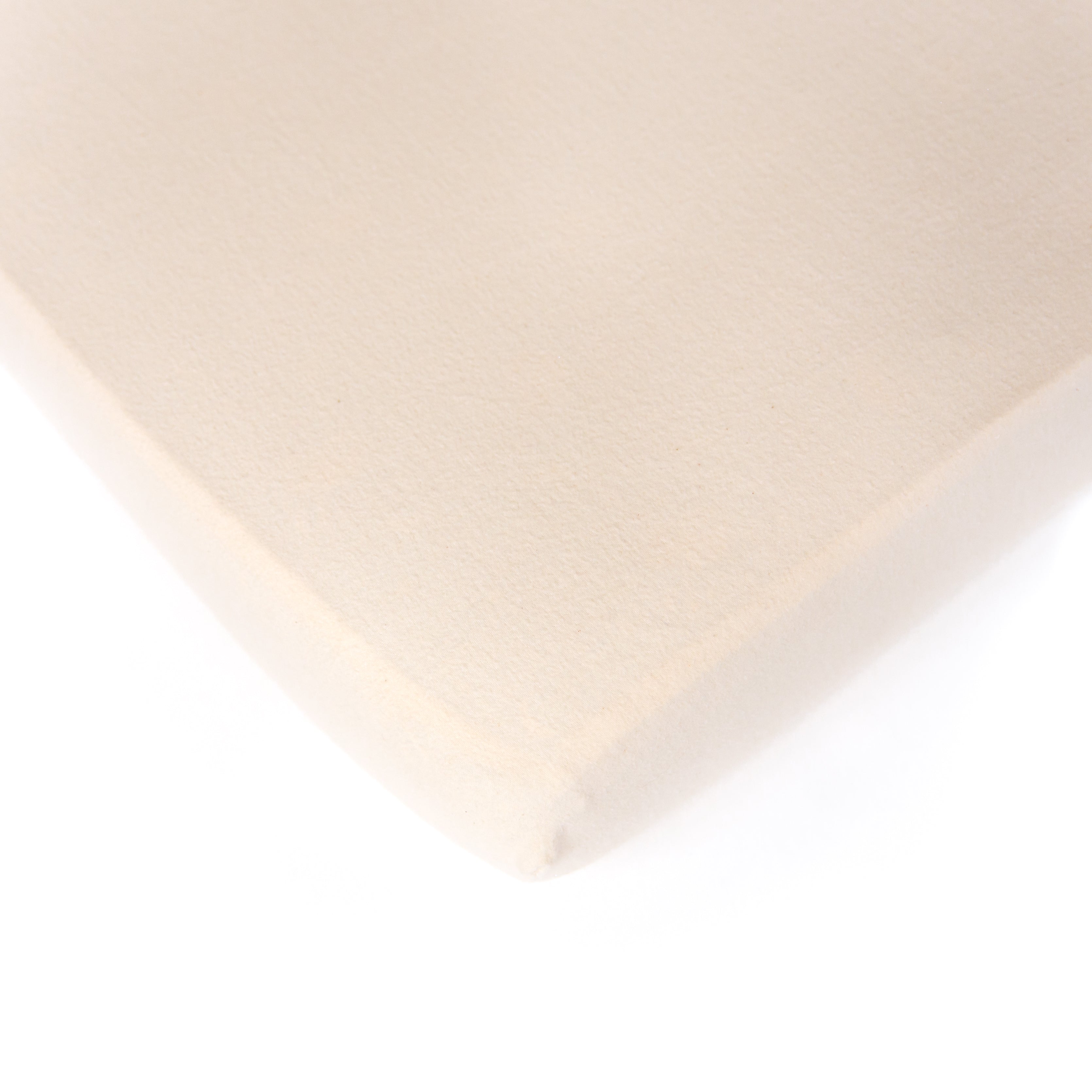A natural, flannel, Oolie organic cotton crib sheet, unprinted, revealing its natural, undyed, unbleached color.