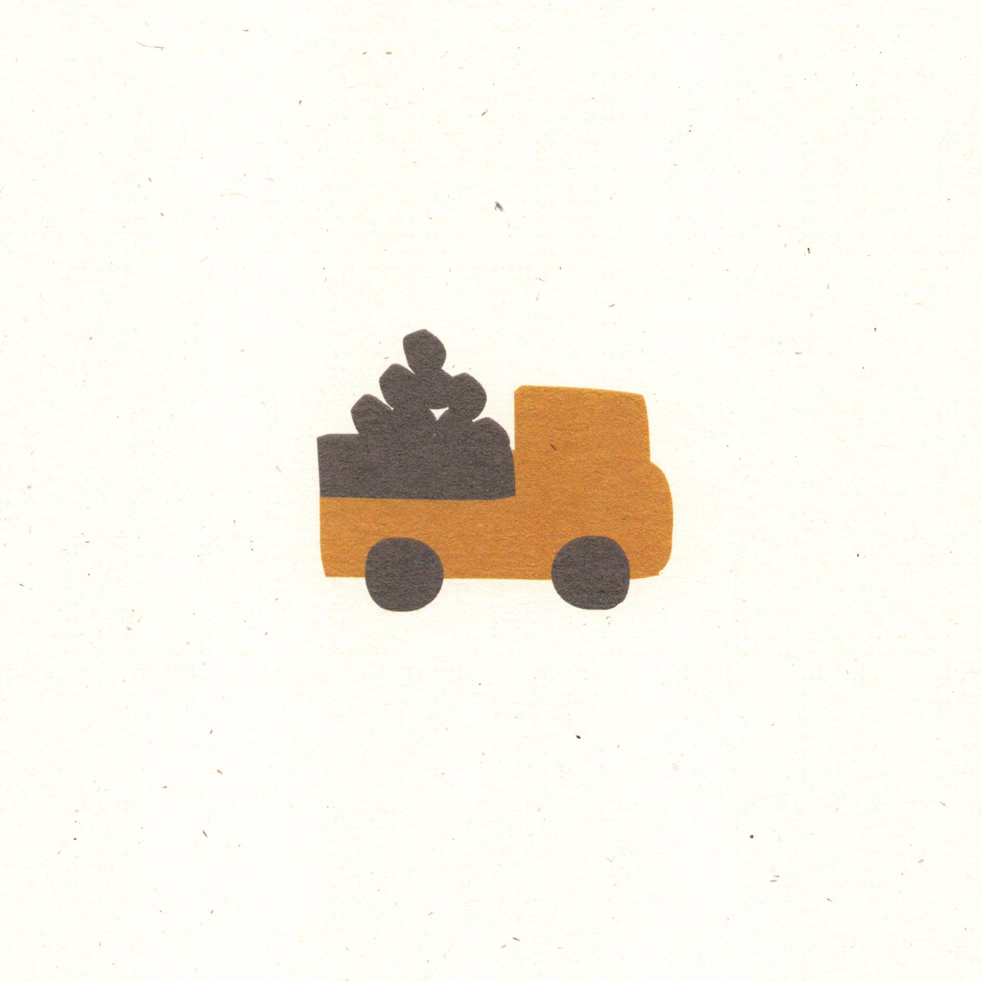 A close-up view of the truck design, printed on recycled, natural paper, with flecks visible in the paper surface.