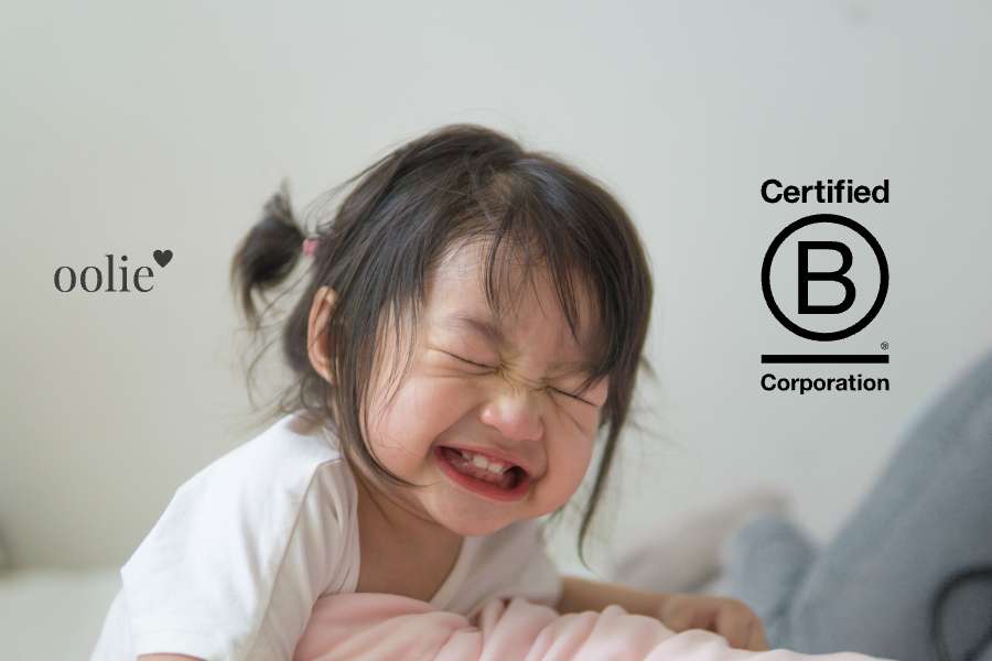 Photog of a happy girl, representing Oolie Certified B Corporation