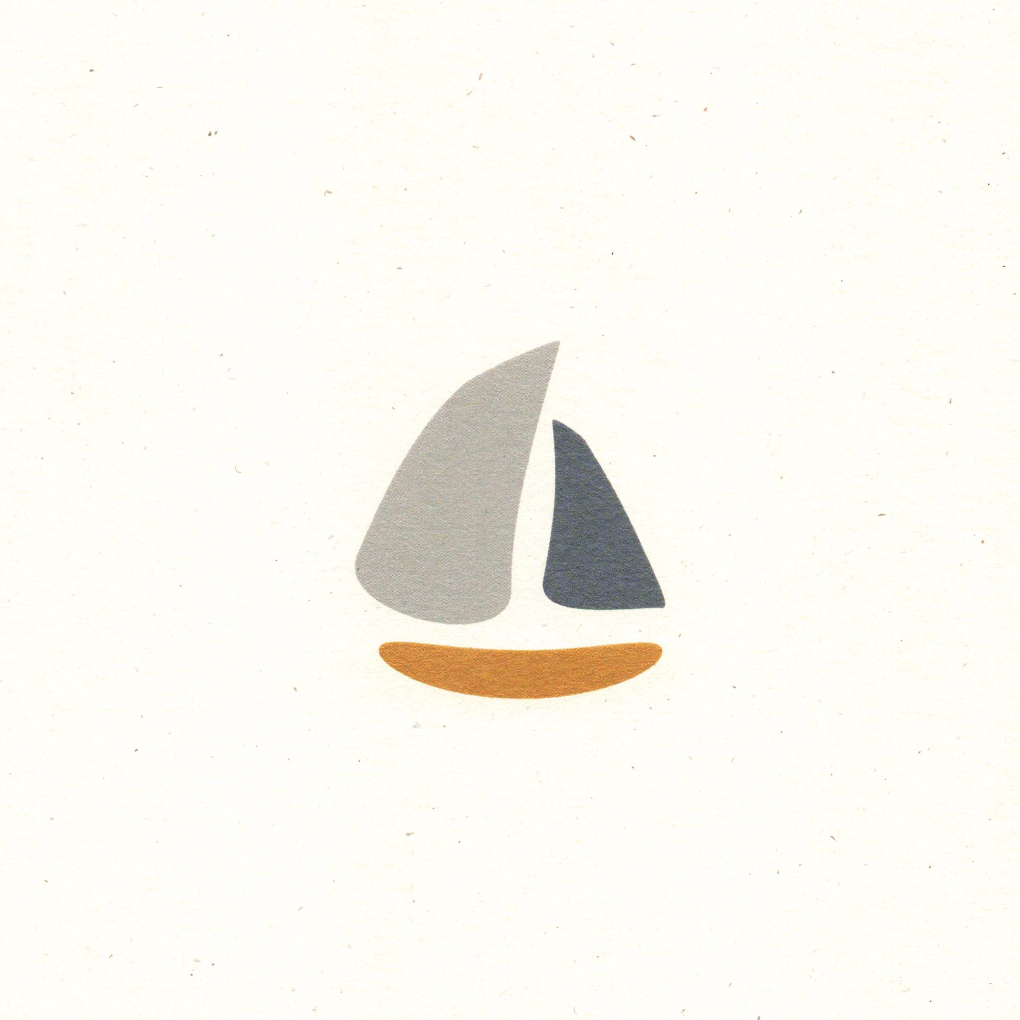 A close-up view of the schooner design, printed on recycled, natural paper, with flecks visible in the paper surface.