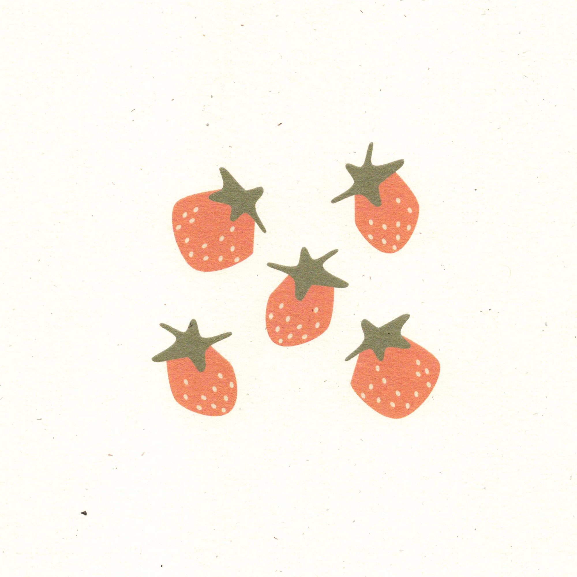 A close-up view of the strawberries design, printed on recycled, natural paper, with flecks visible in the paper surface.
